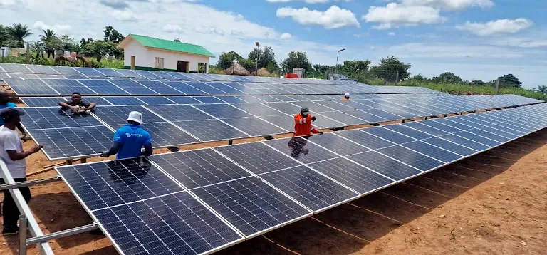 Installation crew on a solar array